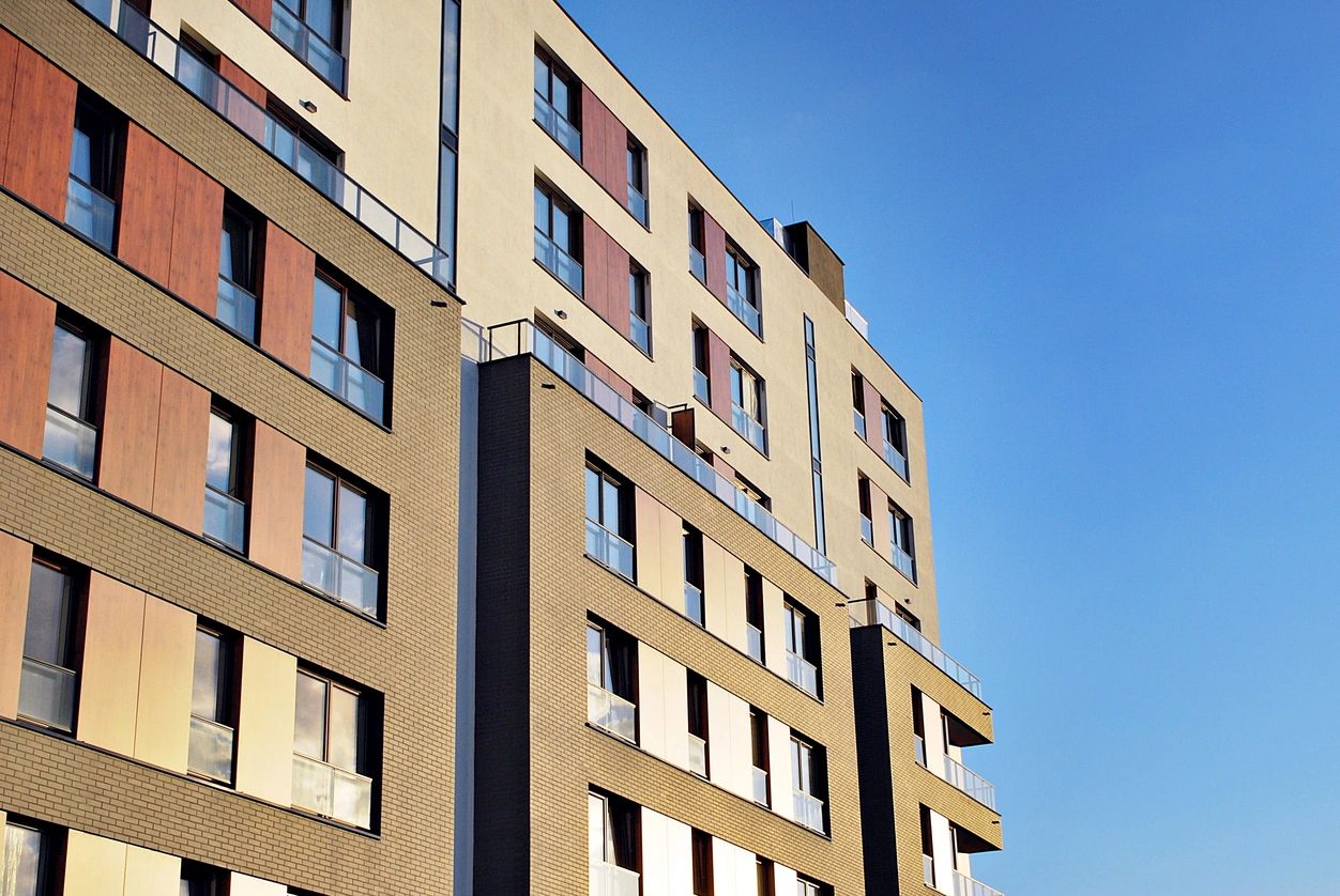 Modern apartment building under clear sky