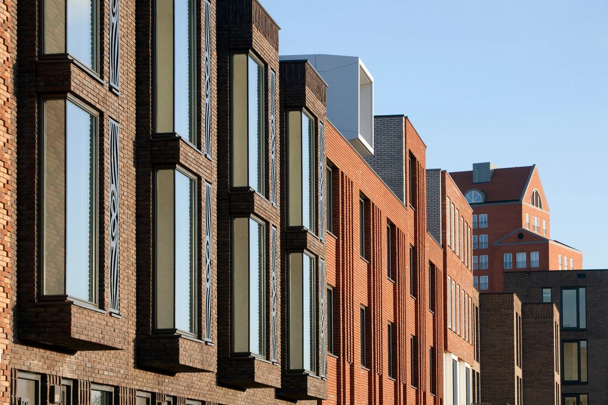 Modern brick buildings under clear sky